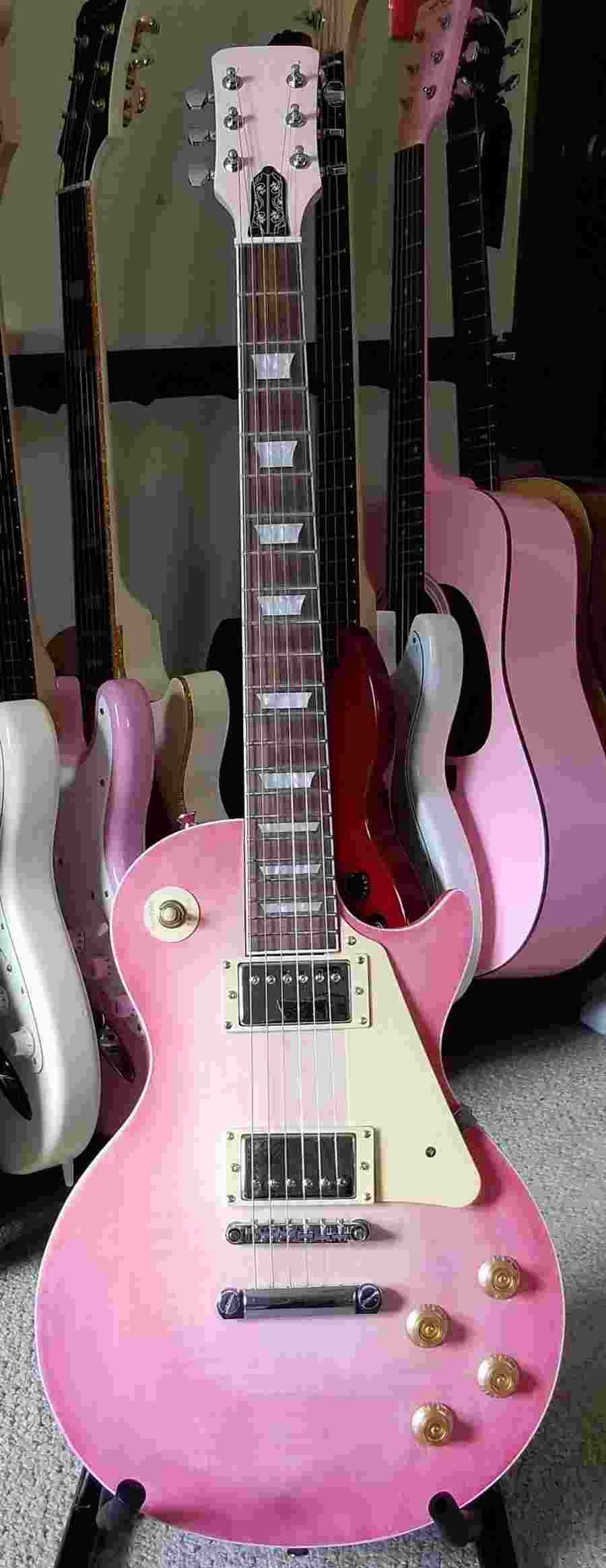 Click to view more information about this item. Pink Les Paul