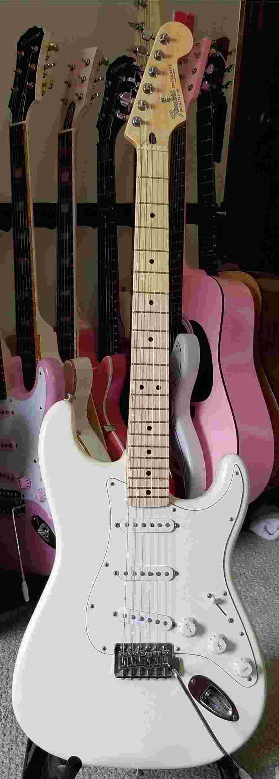 Click to view more information about this item. White Stratocaster